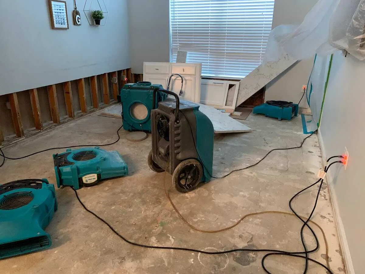 Dehumidifier in flood-cut room for Water Damage Restoration in Sarasota